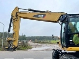 CATERPILLAR M320F wheel-type excavator