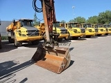 HITACHI ZX 140 W 5 wheel-type excavator