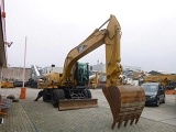 CATERPILLAR M322C wheel-type excavator