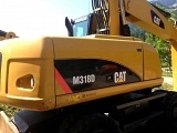 CATERPILLAR M318D wheel-type excavator