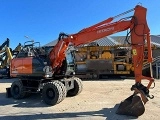 HITACHI ZX 140 W 3 wheel-type excavator