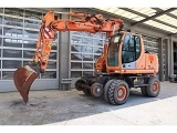 NEW-HOLLAND MH Plus wheel-type excavator