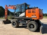 HITACHI ZX 140 W 3 wheel-type excavator