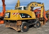 CATERPILLAR M318D wheel-type excavator