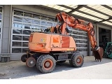 NEW-HOLLAND MH Plus wheel-type excavator