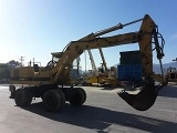 CATERPILLAR 214B FT wheel-type excavator