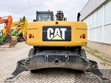 CATERPILLAR M313D wheel-type excavator