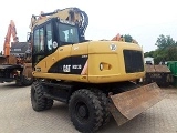 CATERPILLAR M313D wheel-type excavator