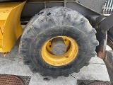 VOLVO EW140B wheel-type excavator