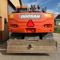 DOOSAN DX 140 W wheel-type excavator