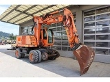 NEW-HOLLAND MH Plus wheel-type excavator