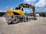 CATERPILLAR M313D wheel-type excavator