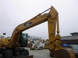 CATERPILLAR M322C wheel-type excavator