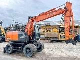 HITACHI ZX 140 W 3 wheel-type excavator