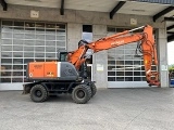 HITACHI ZX 140 W 3 wheel-type excavator