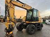 CATERPILLAR M313D wheel-type excavator