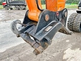 HITACHI ZX 140 W 3 wheel-type excavator