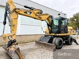 CATERPILLAR M313D wheel-type excavator