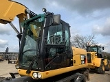 CATERPILLAR M318D wheel-type excavator