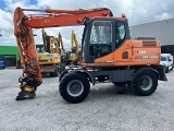 DOOSAN DX 140 W wheel-type excavator