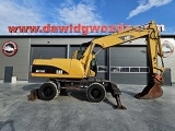 CATERPILLAR M318C wheel-type excavator