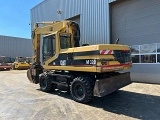 CATERPILLAR M320F wheel-type excavator