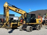 CATERPILLAR M318D wheel-type excavator