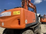 HITACHI ZX 140 W 3 wheel-type excavator