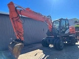 HITACHI ZX 140 W 5 wheel-type excavator