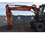 HITACHI ZX 140 W 3 wheel-type excavator