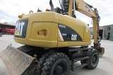 CATERPILLAR M313D wheel-type excavator