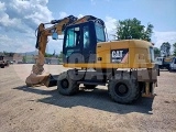 CATERPILLAR M313D wheel-type excavator