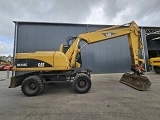 CATERPILLAR M318C wheel-type excavator