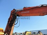 HITACHI ZX 140 W 5 wheel-type excavator