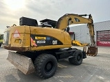 CATERPILLAR M322D wheel-type excavator