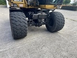 CATERPILLAR M313D wheel-type excavator