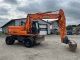 DOOSAN DX 140 W wheel-type excavator