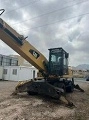 CATERPILLAR M322D wheel-type excavator