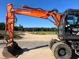 HITACHI ZX 140 W 3 wheel-type excavator