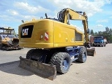 CATERPILLAR M320F wheel-type excavator