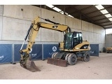 CATERPILLAR M313D wheel-type excavator