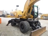 CATERPILLAR M322C wheel-type excavator