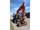 HITACHI ZX 140 W 3 wheel-type excavator