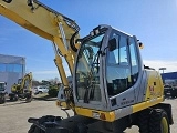 NEW-HOLLAND MH Plus wheel-type excavator