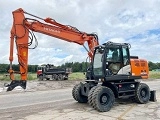 HITACHI ZX 140 W 3 wheel-type excavator