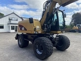 CATERPILLAR M313D wheel-type excavator