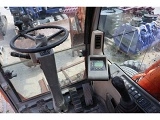 NEW-HOLLAND MH Plus wheel-type excavator