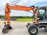 DOOSAN DX 140 W wheel-type excavator