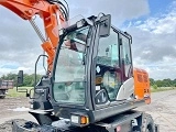 HITACHI ZX 140 W 3 wheel-type excavator