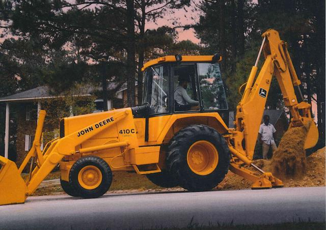 JOHN-DEERE 710 B Excavator-Loader